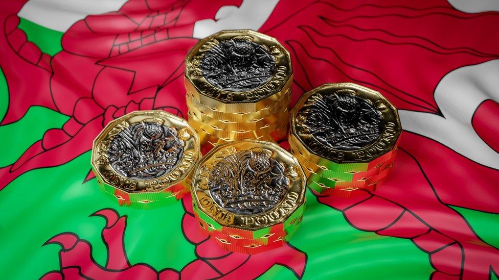 Welsh flag with pounds on it