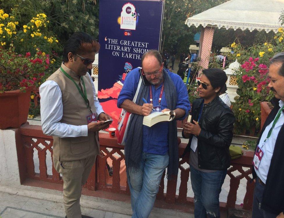 William Dalrymple signing a book
