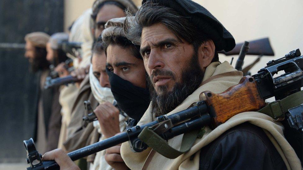 Alleged former Taliban fighters at a disarmament ceremony in Jalalabad, February 2016