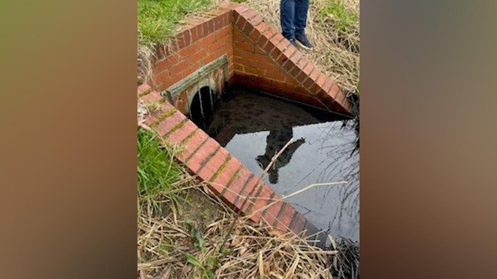 Oil in a brick culvert