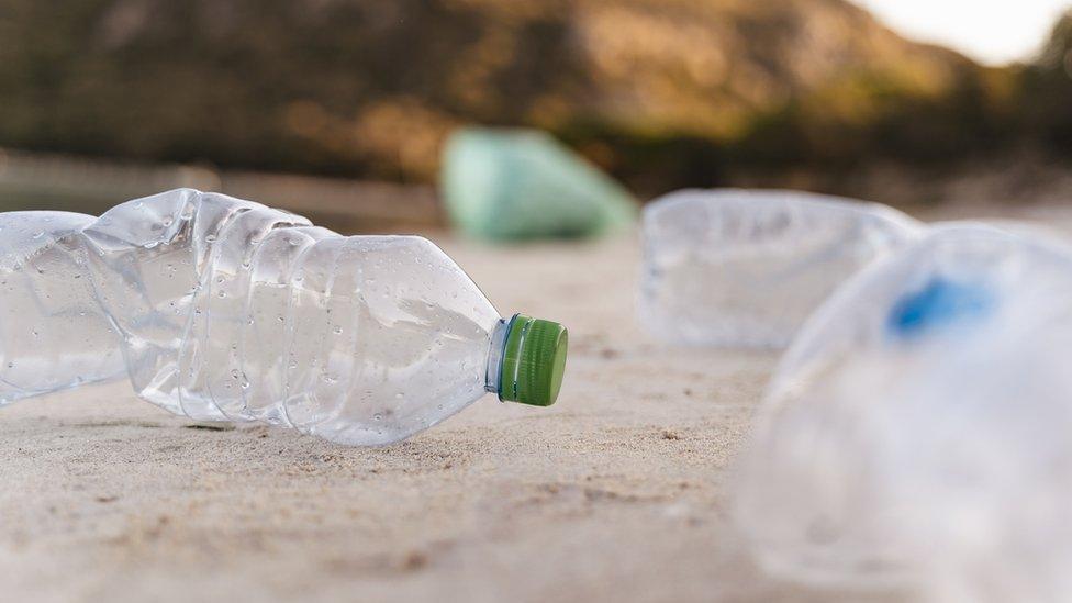 Plastic bottles on beach