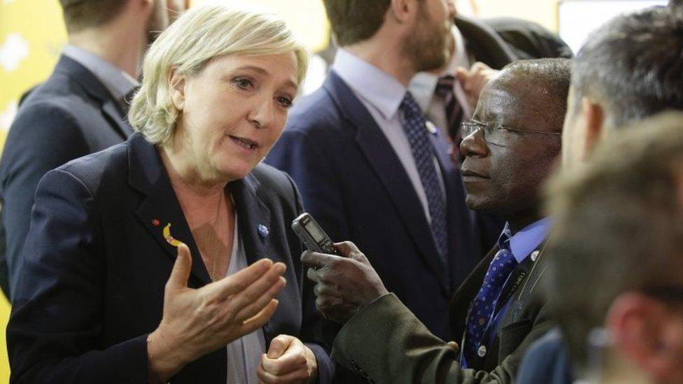 Marine Le Pen (left) at the agriculture fair in Paris. Photo: 28 February 2017