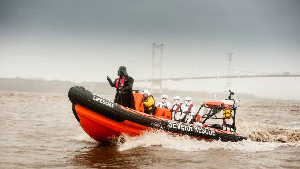 Darth Vader and Stormtroopers on a boat