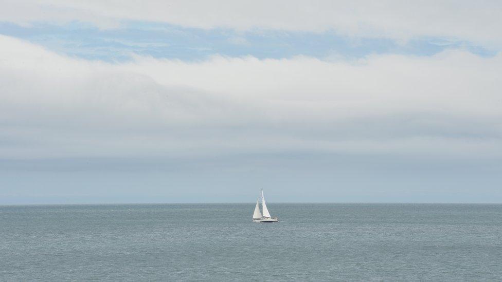 A sailing boat on the sea