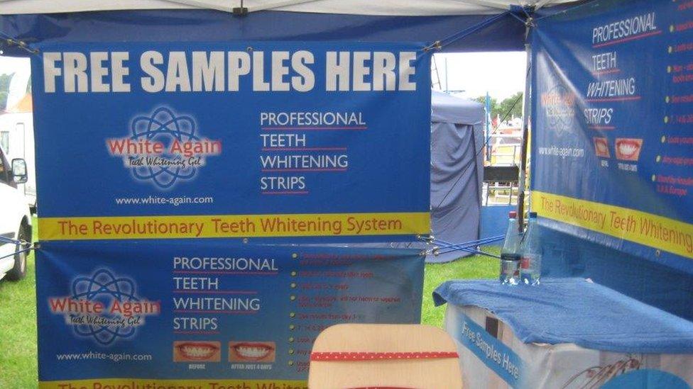 A banner at the teeth whitening stand