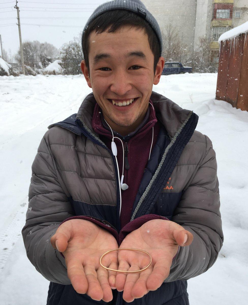 Elaman Asanbaev with the bracelet