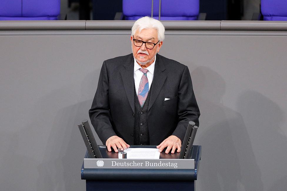 Klaus Schirdewahn, a representative of the queer community, speaks during a memorial ceremony commemorating the victims of the Holocaust at the lower house of the parliament or Bundestag, in Berlin, Germany, on 27 January 2023