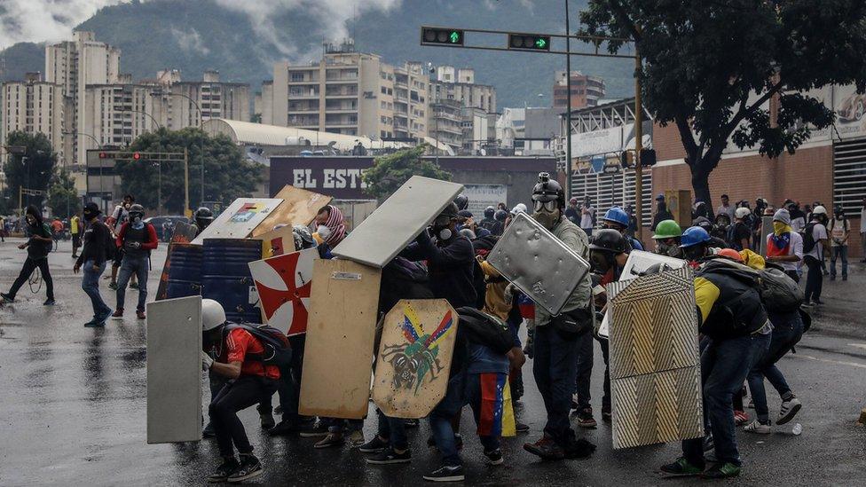 Demonstrators near government offices, in Caracas, Venezuela, 29 June 2017