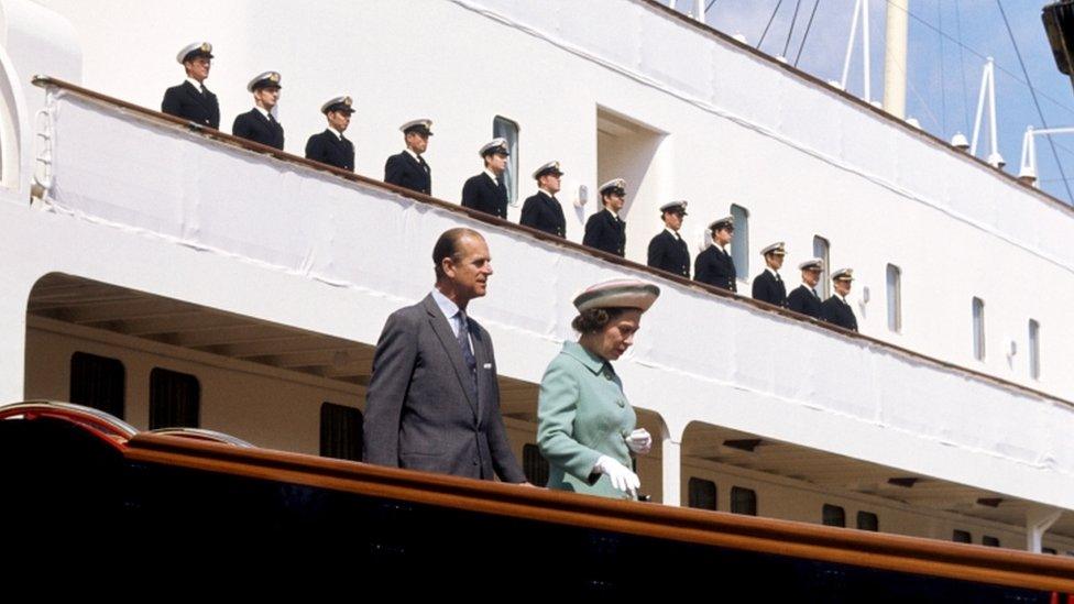 Queen Elizabeth II and the Duke of Edinburgh disembarking from the Royal Yacht Britannia in Portsmouth Dockyard during 1977 Silver Jubilee