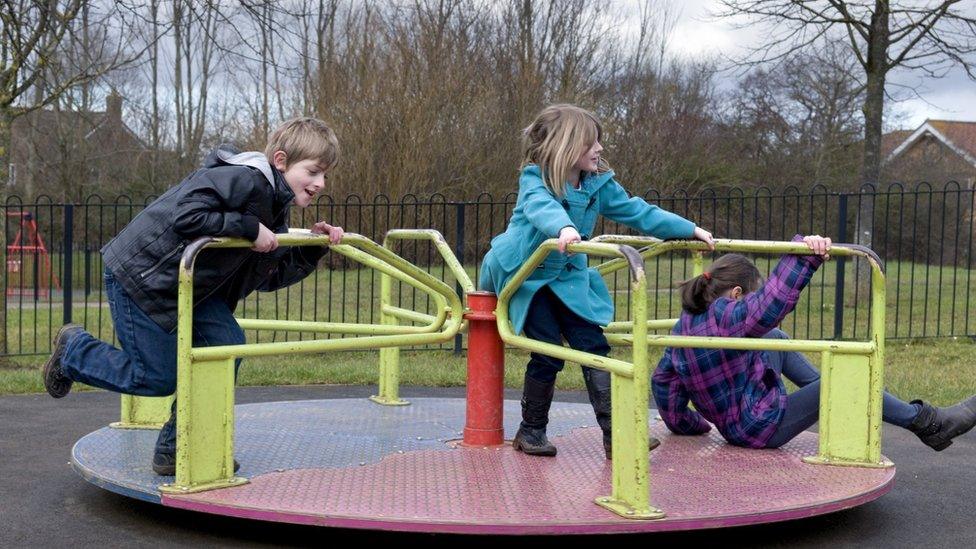 Children on a roundabout