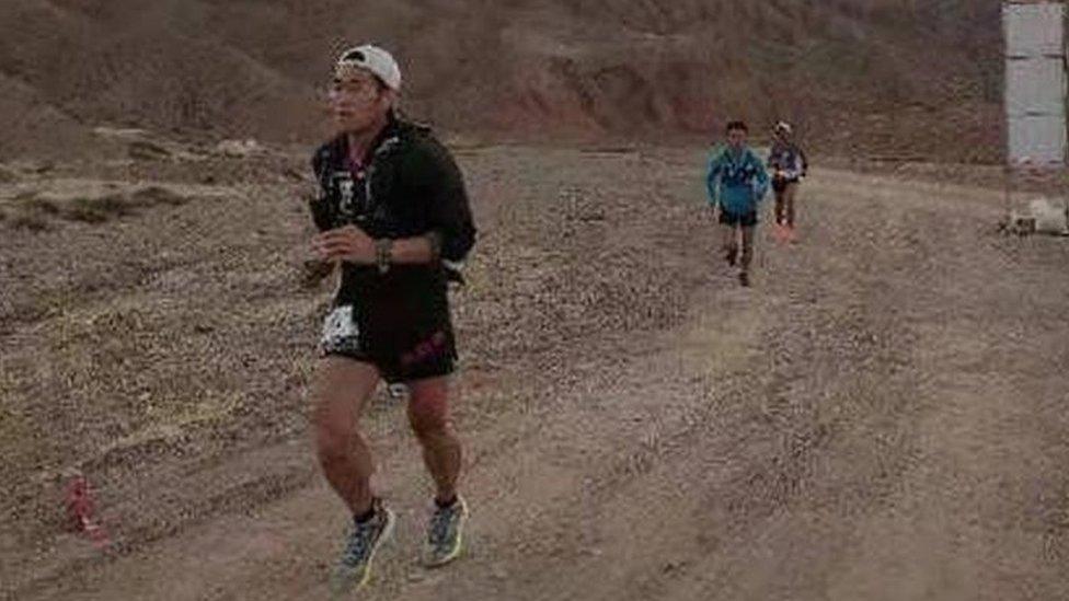 The late runner Liang Jing had worn only shorts and a thin jacket at a race hit by severe weather