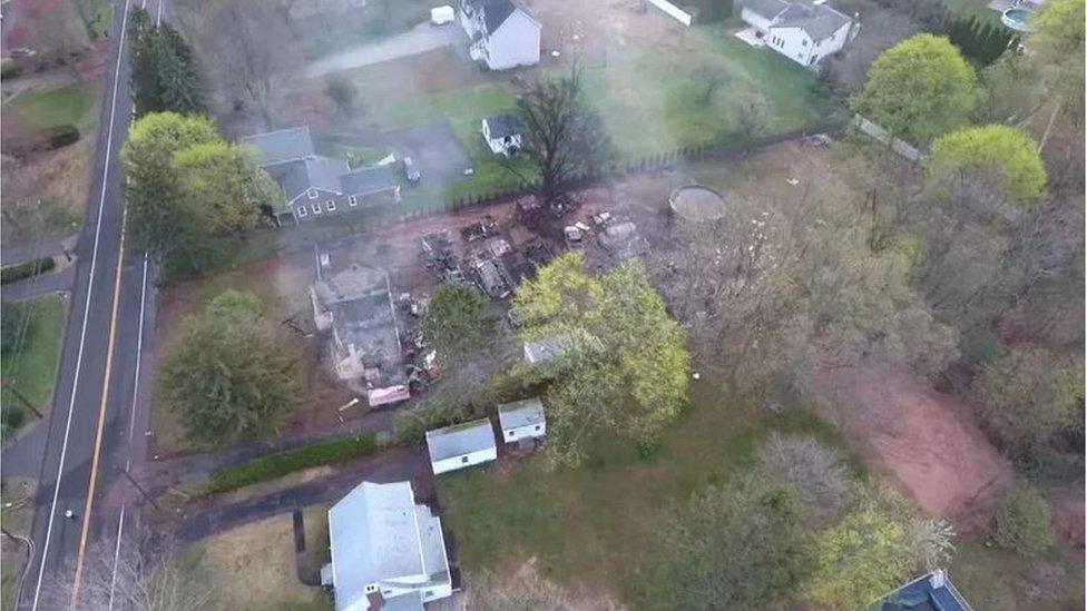 The levelled barn after the fire