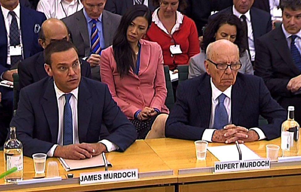 James and Rupert Murdoch appear before a parliamentary committee on phone hacking at Portcullis House in London July 19, 2011