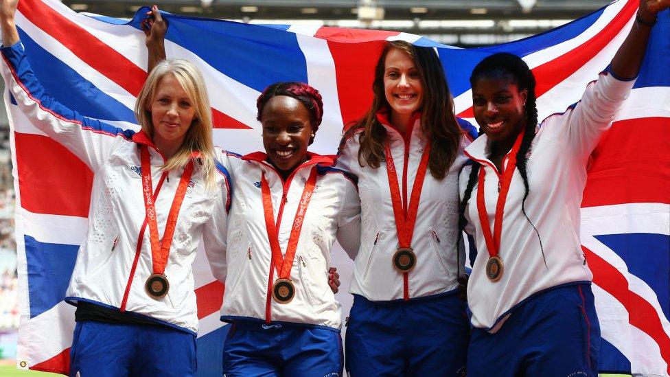 The Great Britain Women's 4x400m relay team celebrate receiving their reallocated bronze medals, from the 2008 Beijing Olympic Games during Day One of the Muller Anniversary Games at London Stadium on July 21, 2018 in London