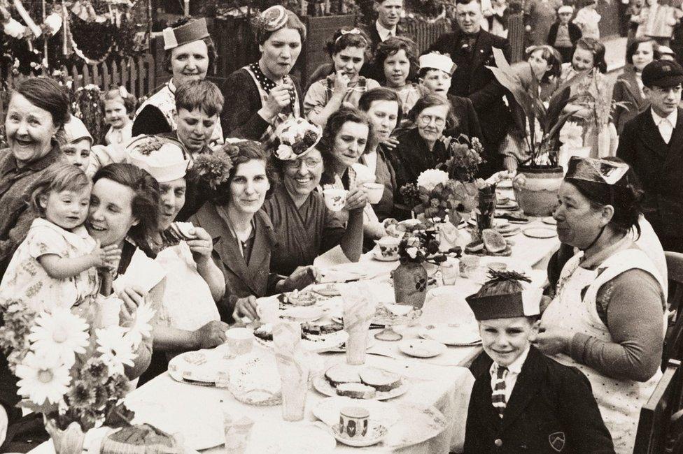 A photograph of a street party in Battersea, London, held to celebrate the Coronation of King George VI 1937