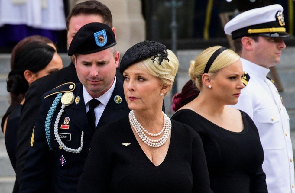 Cindy McCain (C) the widow of US Senator John McCain, and her sons and daughters