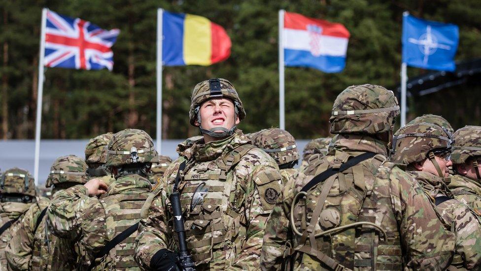 US soldiers are pictured prior the beginning of the official welcoming ceremony of NATO troops in Orzysz, Poland, on April 13, 2017.