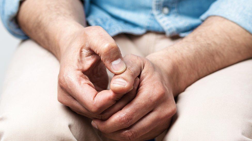 Stock image of a man's hands