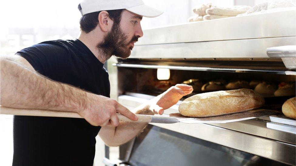 Man baking bread