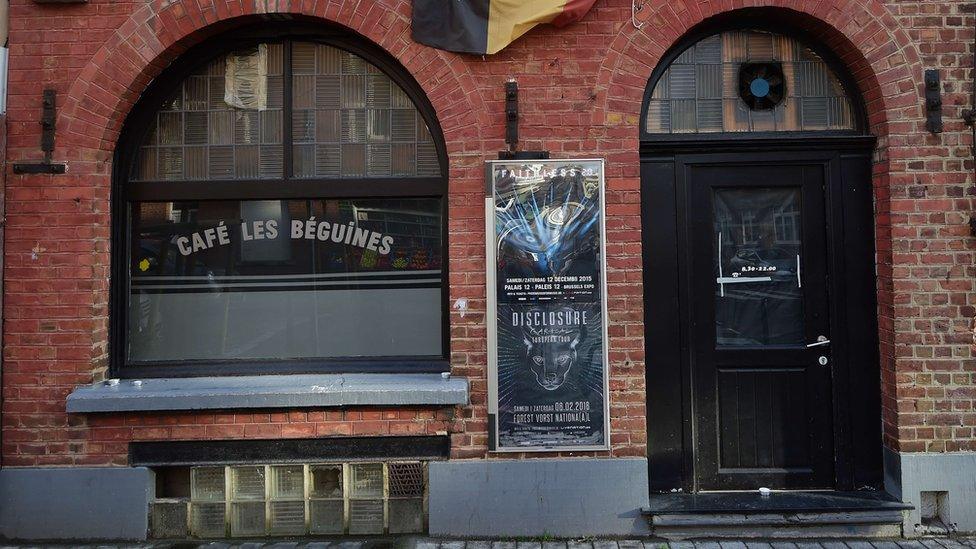 A Belgium flag adorns the front of the bar "Les Beguines", owned by Brahim Abdeslam, one of the suicide bombers implicated in the Paris attacks, on November 17, 2015