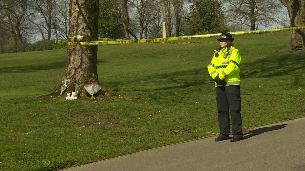 Police officer in park