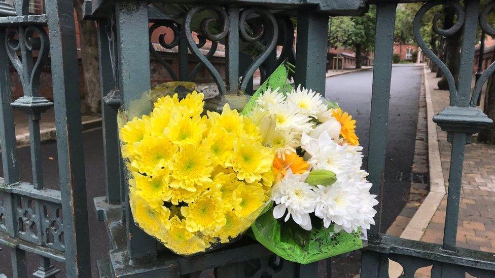 Floral tributes left at the gates of St Malachy’s College on Saturday