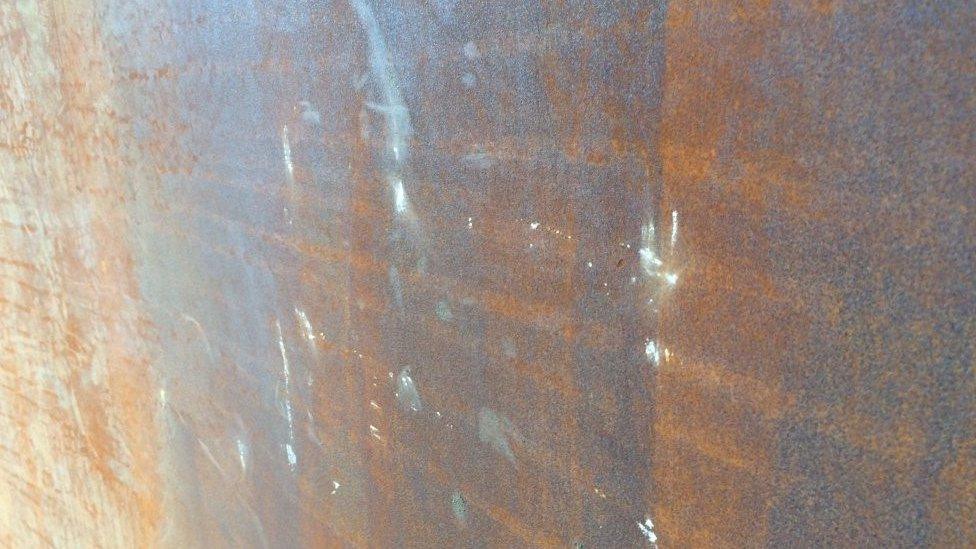 Scuff marks on inside of spire