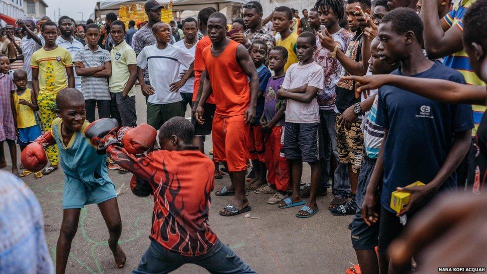 James Town, is home to Ghana's boxing legends and still holds almost all the country's boxing gyms. Boxers are groomed from childhood. Some of the gyms organised children to box on the High Street, as part of the Chale Wote Street Art Festival, 2015.