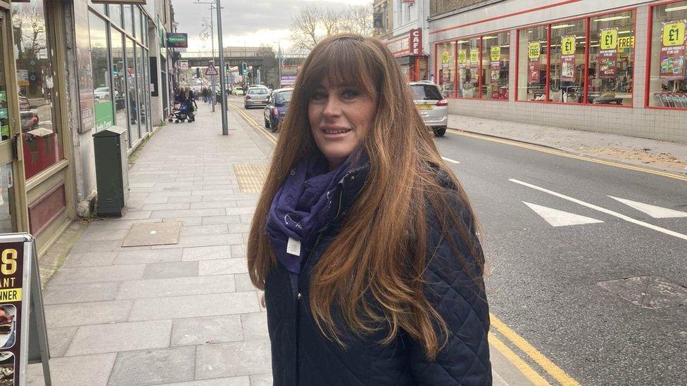 Kelly Tolhurst, MP for Rochester and Strood next to a road