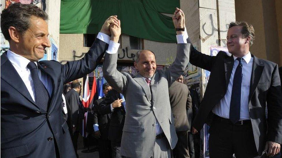 Nicolas Sarkozy, National Transitional Council head Mustafa Abdul Jalil and David Cameron