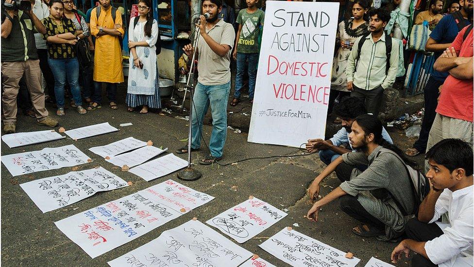 A protest by the students of Jadavpur University against domestic violence on women has taken place in front of the main campus of Jadavpur University