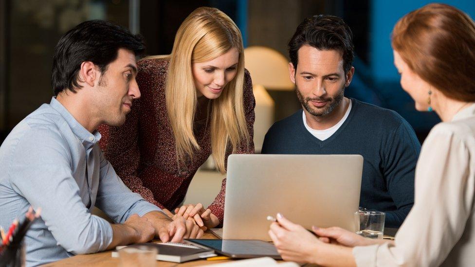 Meeting at a laptop