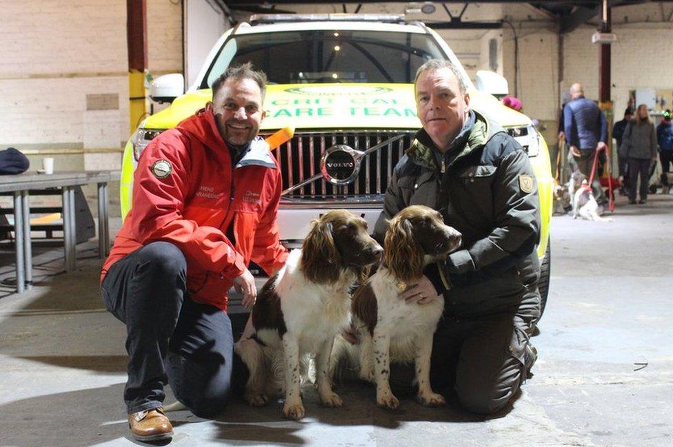 Paddy and Harry in front of the new response vehicle along with their owner Kerry Irving and Lee Salmon of GNAAS