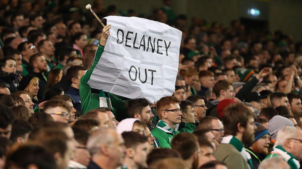 Ireland supporter with 'Delaney Out' poster