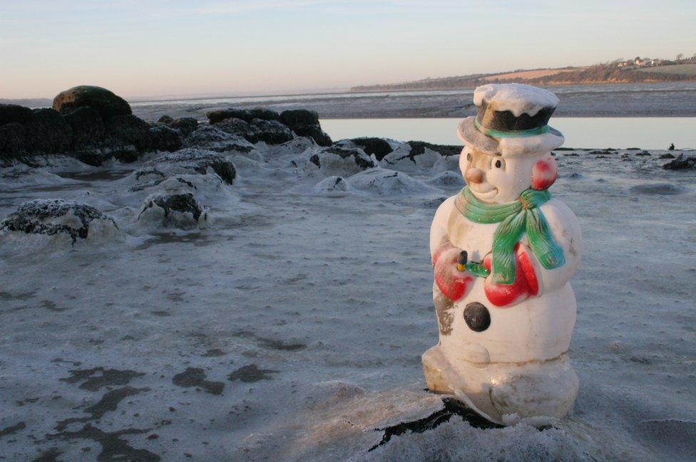 A snowman by the sea