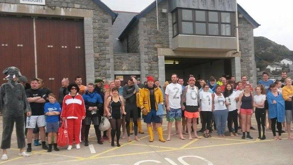 Swimmers outside Barmouth lifeboat station