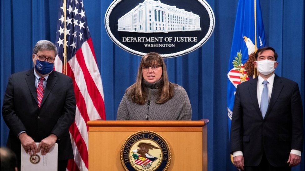 Kara Weipz (C), representative on behalf of the Pan Am 103 victims and their families, delivers remarks beside US Attorney General William Barr (L) and assistant Attorney General for National Security John Demers (R)