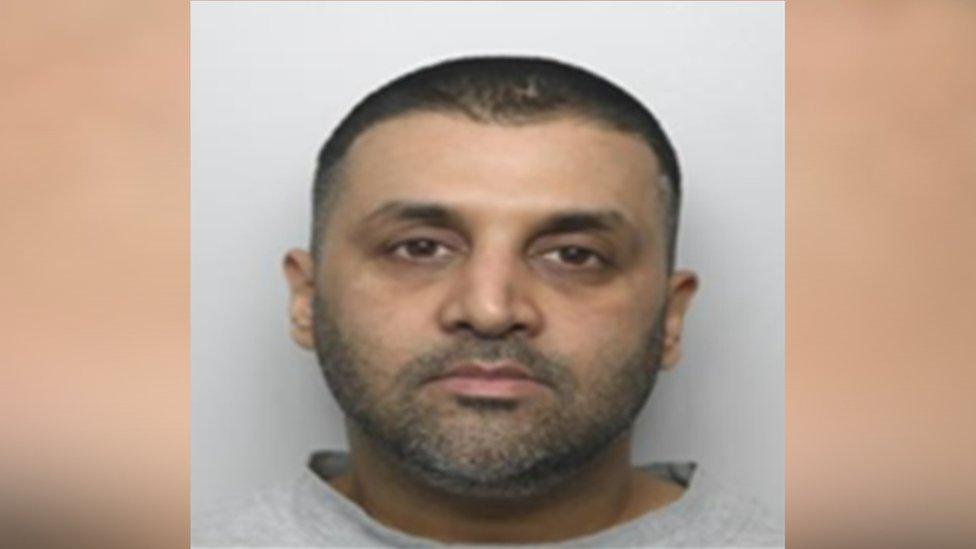 A mugshot of Ishtiaq Khaliq