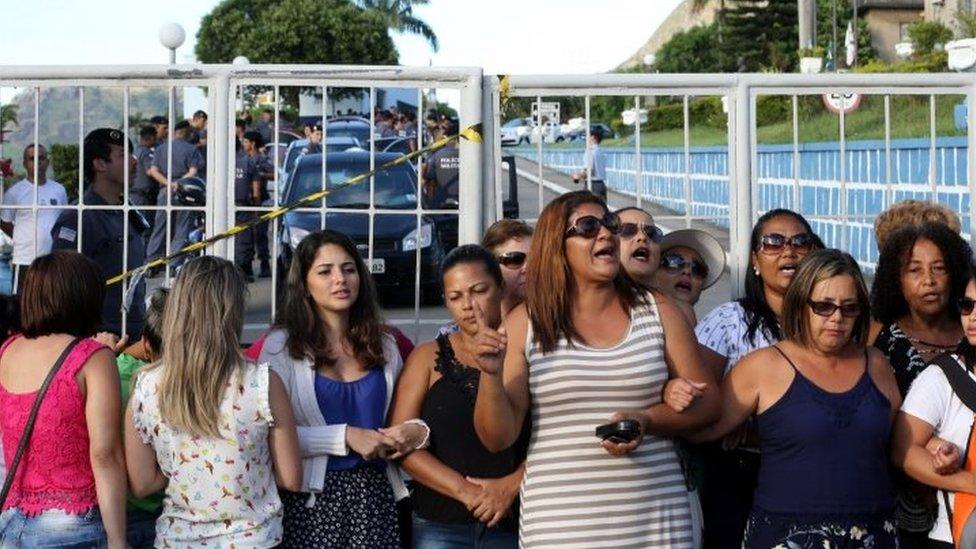 Relatives of military police officers block the main entrance of police headquarters, during a police strike over wages, in Vitoria, Espirito Santo, Brazil February 11, 2017