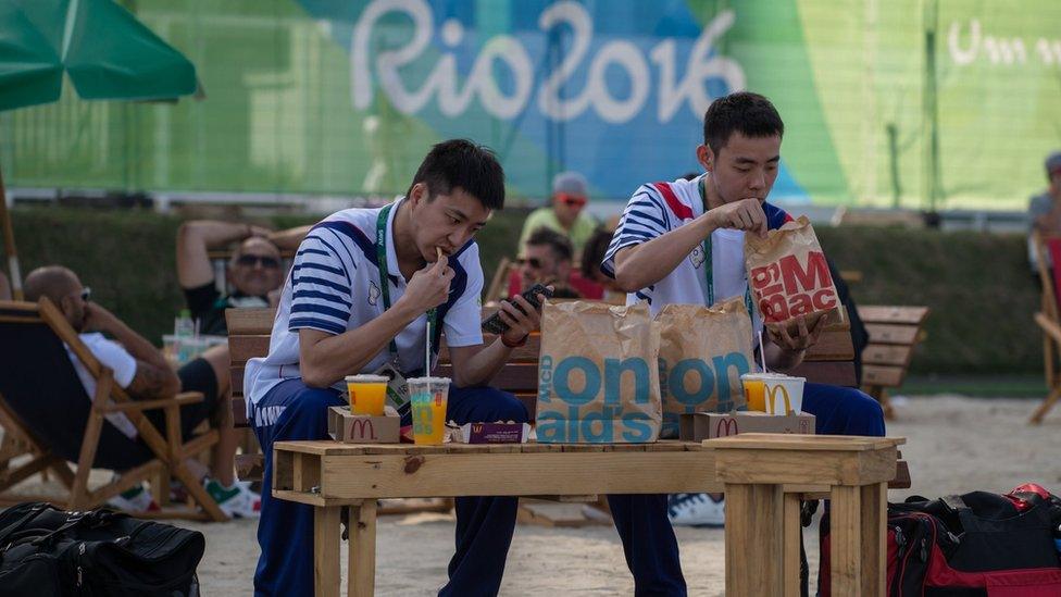 Olympic team from Chinese Taipei eat fast food in athletes village of Rio Olympic Games on August 1, 2016