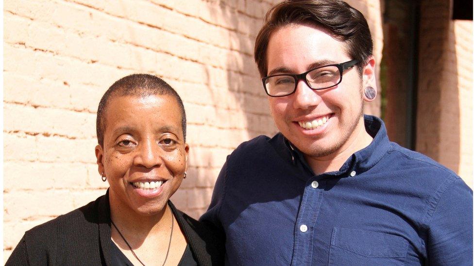 Joaquin Carcano (R), a 28-year-old transgender man, and Angela Gilmore, both of whom are plaintiffs in a lawsuit against North Carolina's transgender bathroom law filed by the ACLU and Lambda Legal advocacy groups, are seen in Raleigh, North Carolina, US, 28 March 2016