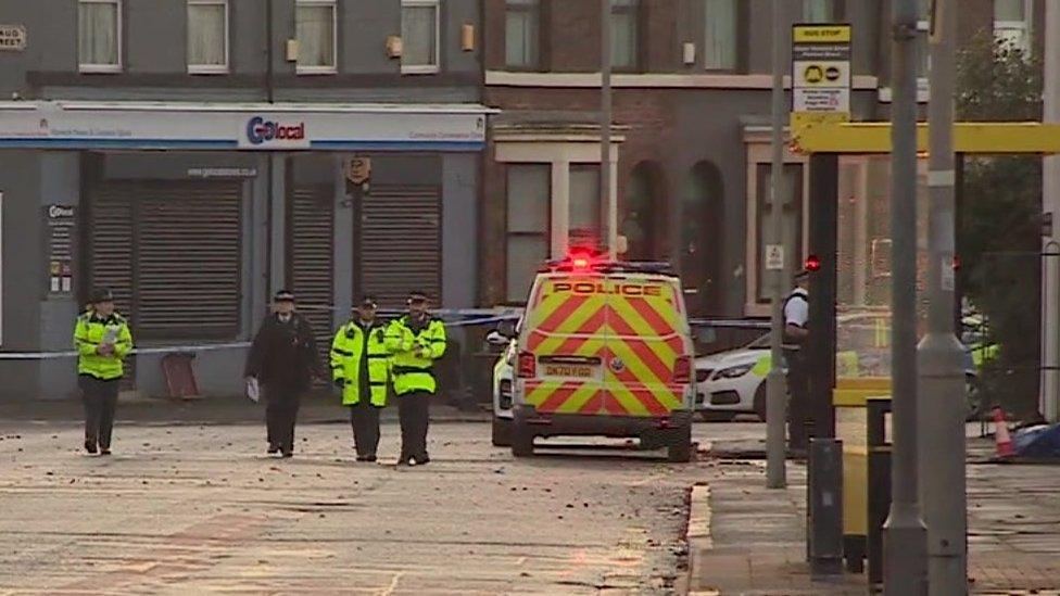 Police at the scene of a stabbing in Toxteth