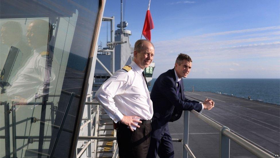 Captain Jerry Kyd (left) with Defence Secretary Gavin Williamson onboard HMS Queen Elizabeth