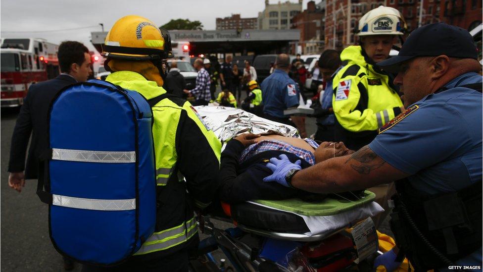 People are treated for injuries outside Hoboken station on 29 September 2016