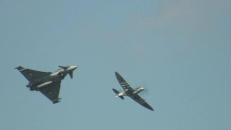 The Spitfire and the modern Typhoon flying side by side