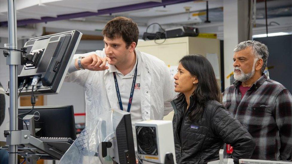 Teddy Tzanetos, MiMi Aung and Bob Balaram of NASA's Mars Helicopter project observe a flight test