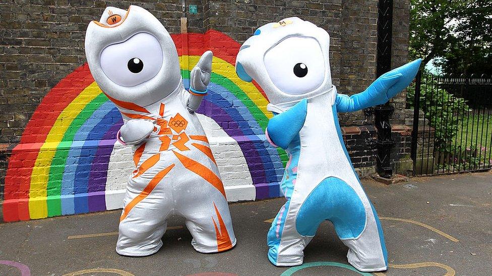 Wenlock and Mandeville are silver. Wenlock has orange marking and Mandeville has blue markings. They both have one eye