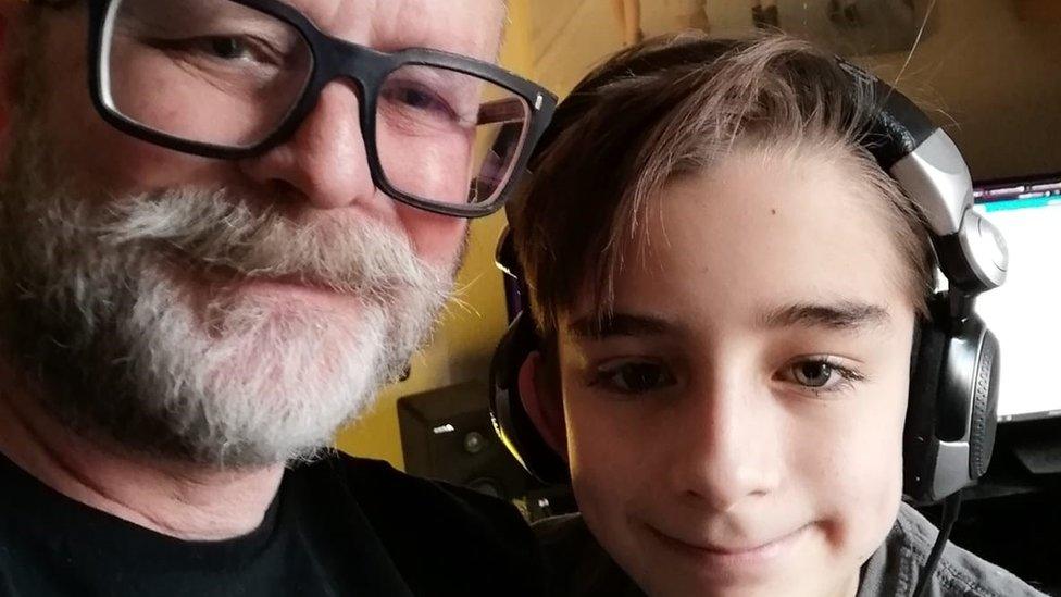 Image of Alan Freeman and his son