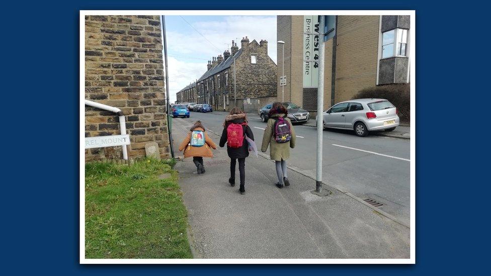 Emma's children and their friend walk home from school