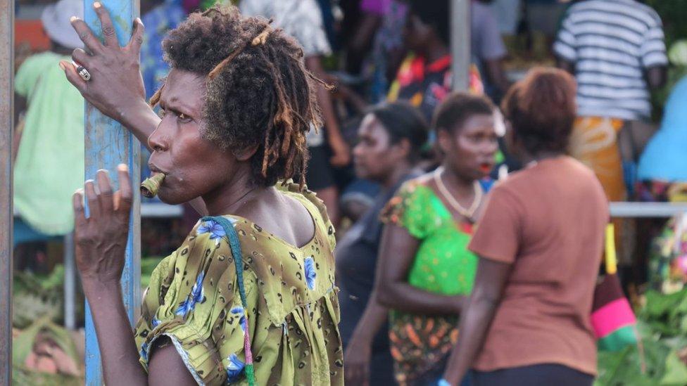 Woman chewing betel nut on a market in Bougainville